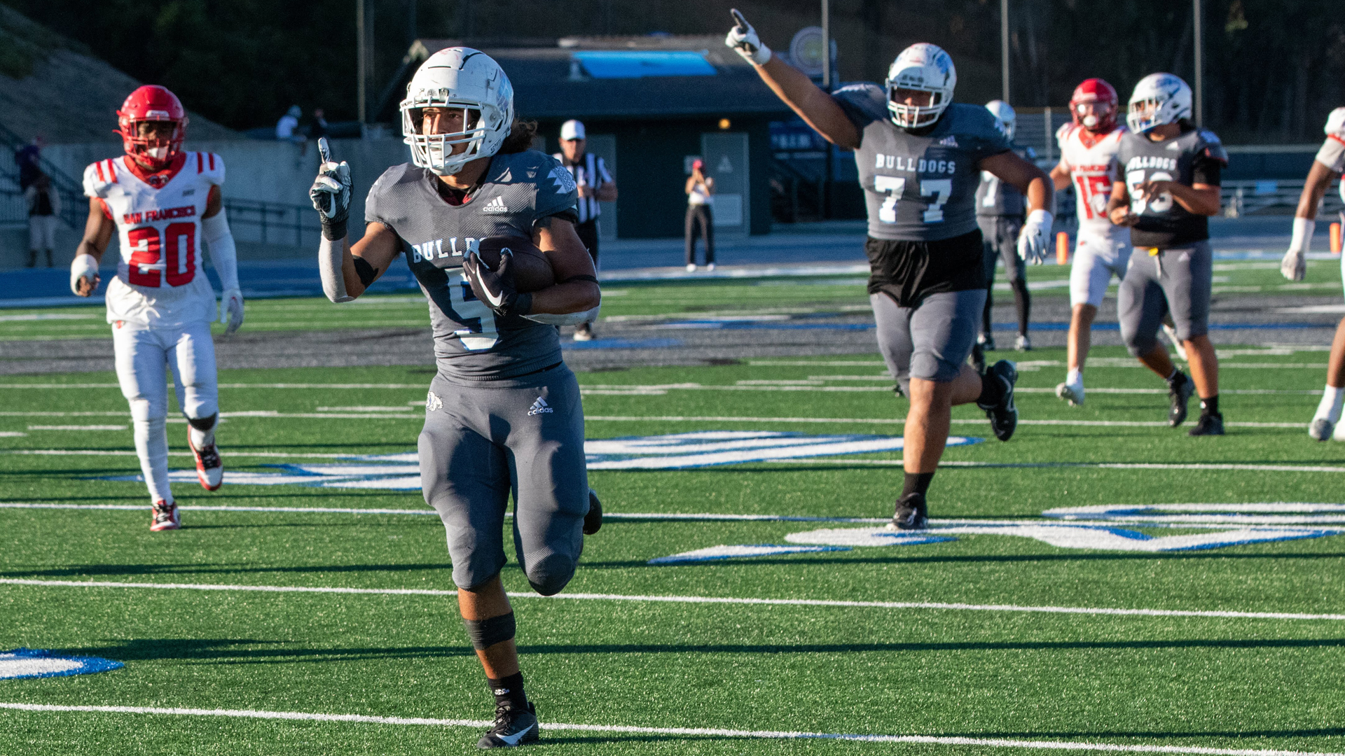 Nate Sanchez runs in for a 34-yard TD in the Bulldogs' win over CCSF. (Photo by Ronald Rugel Photography)