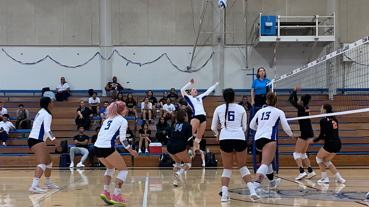 Sophomore Naomie Cremoux goes up for a kill in the win over Cosumnes River.