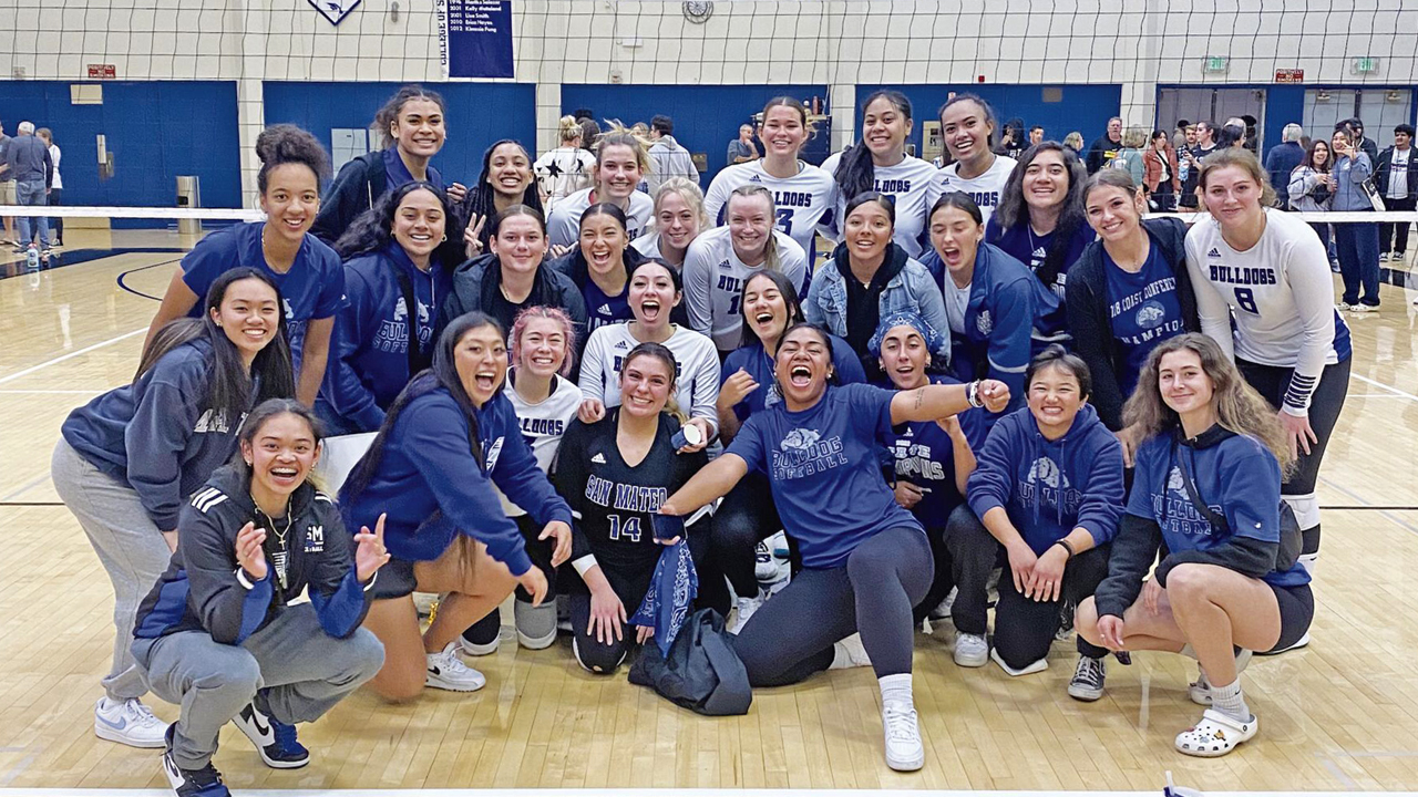 Members of the CSM softball team celebrate with women's volleyball following their win over Cabrillo on Saturday. (Photo by The Daily Journal)